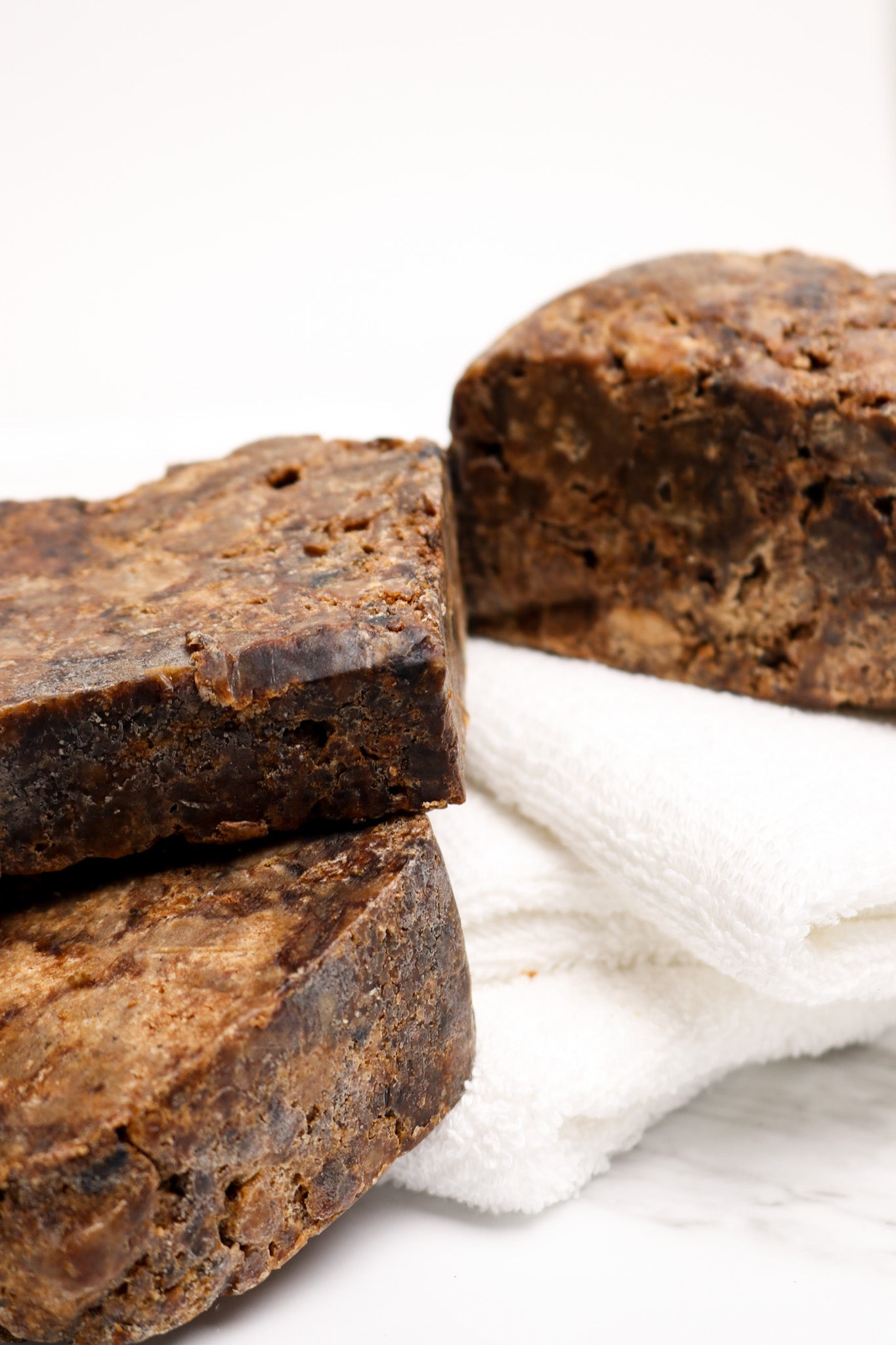 Our Sunny In Denbigh African black soap cleanses Skin, is great for Sensitive Skin Types, Soothes & Heals Eczema, Reduces Blemishes & Dark Spots, Fights Facial & Body Acne, Calms Psoriasis, Reduces Oily Skin, and Minimizes Fine Lines & Wrinkles, Evens Out Dark Spots, Unclogs Blocked Pores, Helps Fade Acne Scars, Soothes Razor Bumps, Eliminates Fungal Skin Infections.